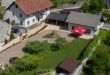 Apartmaji Pr`Pišk - pogled na hišo in vrt