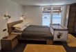 Apartmaji Pr`Pišk - postelja z otroško posteljico